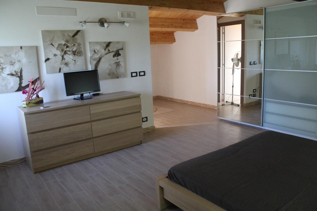Appartamento Le Tre Palme Frigintini Δωμάτιο φωτογραφία